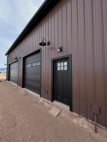 Entry door detail with barn lights