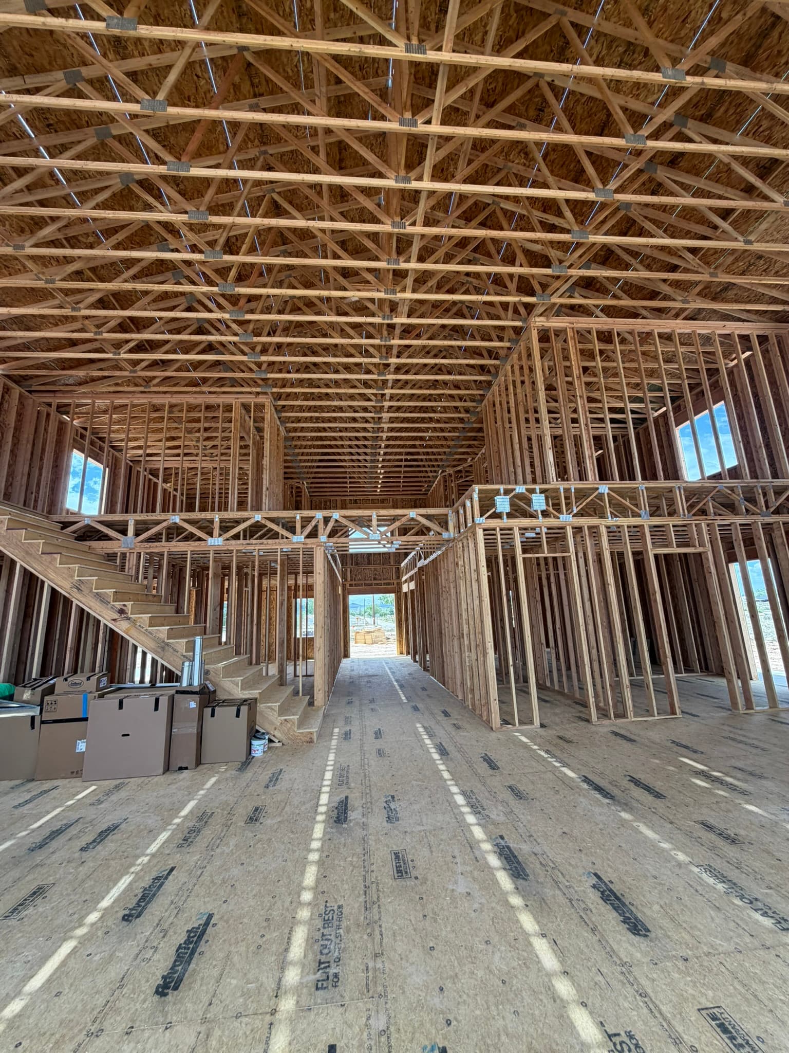 Interior framing with trusses overhead